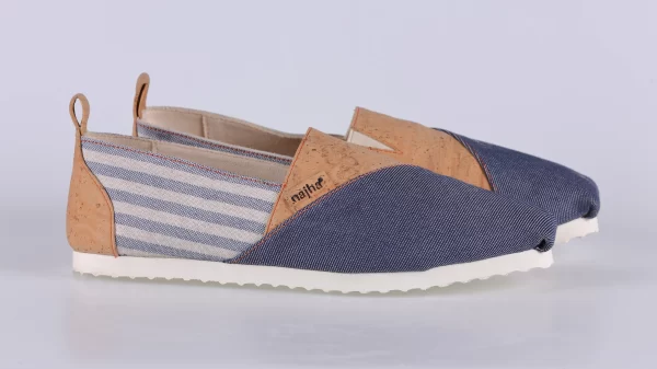 Najha Fashion blue slip-ons made with recycled fabrics, cork details, and anatomic soles for sustainable luxury.