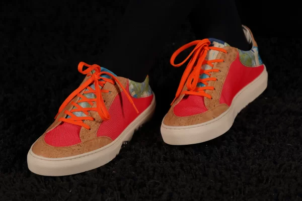 Najha Fashion women’s red designer sneakers, sustainable luxury footwear with detailed craftsmanship and perfect fit.