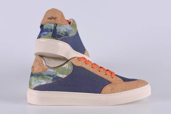 Najha Fashion blue sustainable sneakers with recycled materials, ergonomic comfort, and signature logo detail.